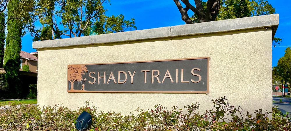 Shady Trails cemented signage with pale yellow paint-Homes For Sale in Shady Trails Fontana-Featured Image | Alvin Tapia